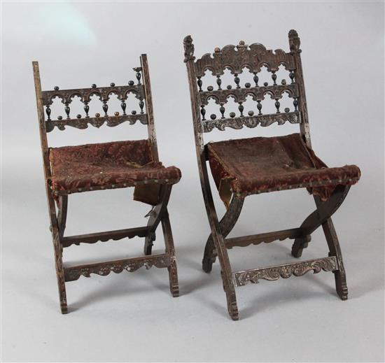 A pair of Continental walnut folding stools